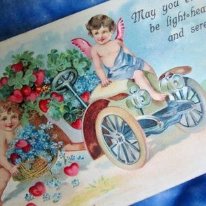 love card Valentine from the 1910s ... forget-me-nots, four-leaf clover, cherubs
